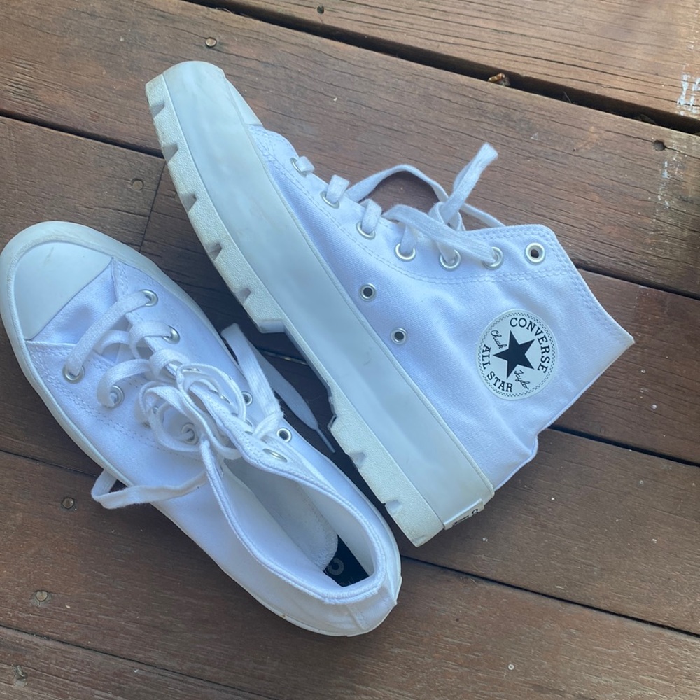 White all star chuck taylor converse high top sneakers.